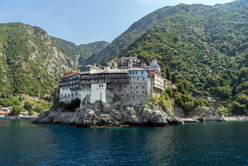 View of Mount Athos monasteries from the sea during Mount Athos Cruise in Halkidiki, Greece