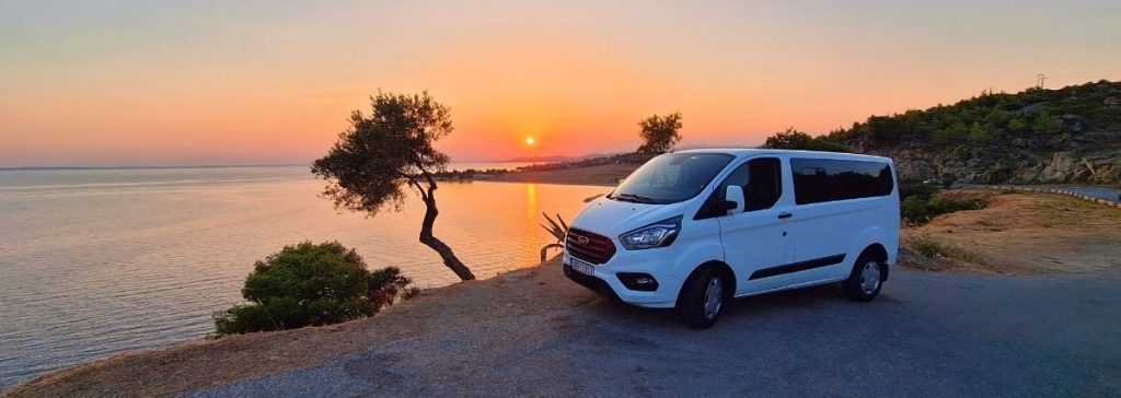 Airport transfer van in Sithonia, Halkidiki at sunset