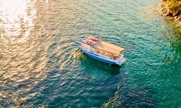 Boat for 20 people seen from drone available for rental with captain in Sithonia, Halkidiki